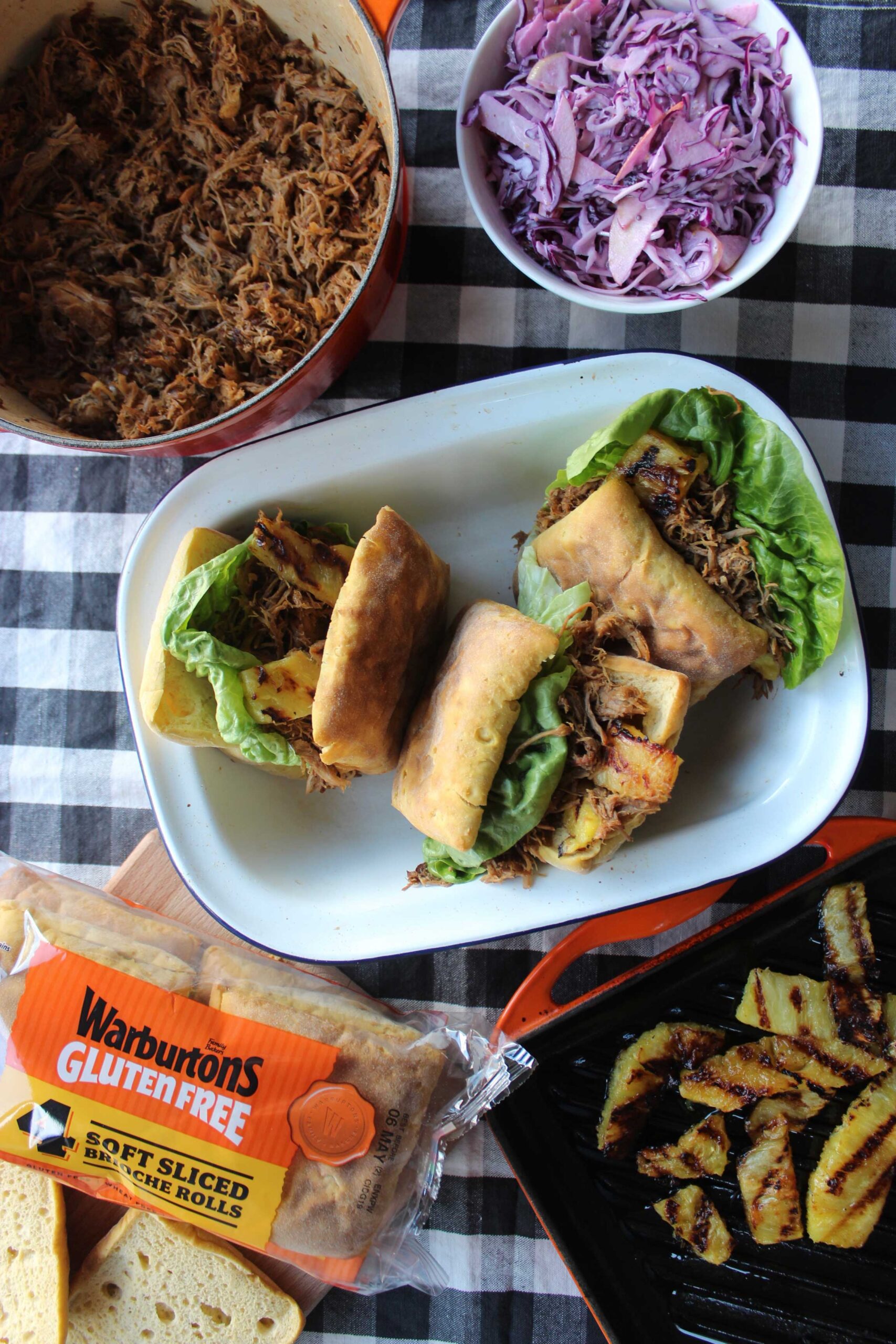 BBQ pulled pork Brioche Rolls with homemade slaw and charred pineapple